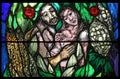 Creation and birth, detail of stained glass window in St. James church in Hohenberg, Germany