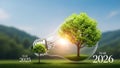 Creative 2026 Concept with Growing Tree and Light Bulb Symbolizing Innovation, Sustainability, Ideas and Future Vision Royalty Free Stock Photo