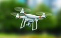 Quadcopter drone with 4K video camera flying in the air Royalty Free Stock Photo
