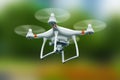 Quadcopter drone with 4K video camera flying in the air Royalty Free Stock Photo