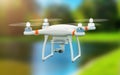 Quadcopter drone with 4K video camera flying in the air Royalty Free Stock Photo