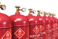 Row of liquefied acetylene industrial gas containers Royalty Free Stock Photo