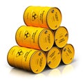 Group of stacked yellow drums with radioactive waste isolated on