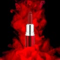 Creative advertising photo of lipstick. Abstract background of paint in water. Photographic product