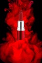 Creative advertising photo of lipstick. Abstract background of paint in water. Photographic product Royalty Free Stock Photo