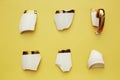 Creative aesthetic broken cup's pieces on yellow background. Creative conceptual home decorations idea. Hope, cozy