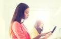 Creative african woman with tablet pc at office