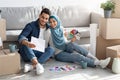 Creative arab family planning renovation in their new house Royalty Free Stock Photo