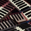 A creative arrangement of overlapping piano keyboards with black and white keys. Royalty Free Stock Photo