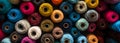 Seamless Rows of colourful Bobbin of yarn wool woollen balls roll pile up