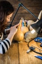 Creative artisan woman working in workshop