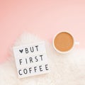 Creative autumn flat lay overhead top view coffee cup vintage lightbox But coffee first text on millennial pink background copy