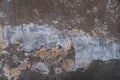 Creative background. Blue, grey, orange and brown rough weathered stone texture with stucco and paint Royalty Free Stock Photo