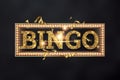 Creative background, the inscription bingo in gold letters on a dark background. Concept win, casino, idea, luck, lotto. 3D Royalty Free Stock Photo