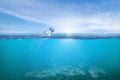 Creative background, plastic bottle floating in the ocean, a bottle in the water