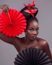 Creative beauty, portrait and makeup with black woman in studio for art and culture. Fashion, cosmetics and paper design Royalty Free Stock Photo