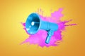 Creative blue megaphone with a colored pink burst on an orange background. Creative attention colorful idea and audio message