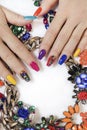 Creative bright saturated manicure on long nails with rhinestones.