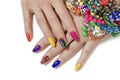 Creative bright saturated manicure on long nails with rhinestones.