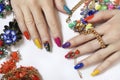 Creative bright saturated manicure on long nails with rhinestones. Royalty Free Stock Photo