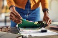 Creative business black woman organizing documents on desk at office