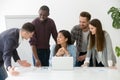 Multiracial group having discussion at meeting with asian team l Royalty Free Stock Photo