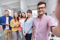 Creative business team taking selfie at office Royalty Free Stock Photo