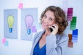 Creative businesswoman having phone call Royalty Free Stock Photo