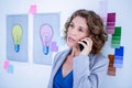 Creative businesswoman having phone call Royalty Free Stock Photo