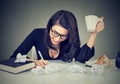 Creative busy woman working at her desk Royalty Free Stock Photo