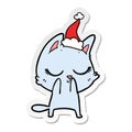 A creative calm sticker cartoon of a cat wearing santa hat