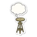 A creative cartoon artist stool and thought bubble as a printed sticker