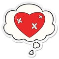 A creative cartoon beaten up heart and thought bubble as a printed sticker Royalty Free Stock Photo