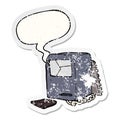 A creative cartoon broken old computer and speech bubble distressed sticker Royalty Free Stock Photo