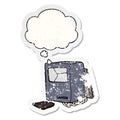 A creative cartoon broken old computer and thought bubble as a distressed worn sticker Royalty Free Stock Photo