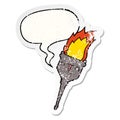 A creative cartoon flaming chalice and speech bubble distressed sticker Royalty Free Stock Photo