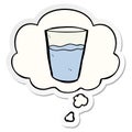 A creative cartoon glass of water and thought bubble as a printed sticker Royalty Free Stock Photo