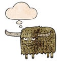 A creative cartoon hairy cow and thought bubble in grunge texture pattern style