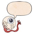 A creative cartoon injured eyeball and speech bubble in retro texture style