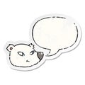 A creative cartoon polar bear face and speech bubble distressed sticker Royalty Free Stock Photo