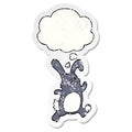 A creative cartoon rabbit running and thought bubble as a distressed worn sticker Royalty Free Stock Photo