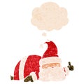 A creative cartoon sleepy santa and thought bubble in retro textured style