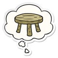A creative cartoon small stool and thought bubble as a printed sticker