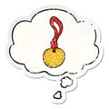 A creative cartoon sports medal and thought bubble as a distressed worn sticker Royalty Free Stock Photo