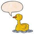 A creative cartoon swimming duck and speech bubble in retro texture style Royalty Free Stock Photo