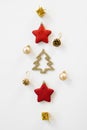 Creative Christmas. Greeting card layout flat lay, top view. Christmas toys Golden and red