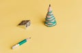 Creative christmas tree. Pencil for shavings, pencil and sharpener on a yellow background. Christmas concept in office