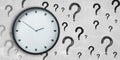 Creative clock and question marks sketch on concrete wall background. Royalty Free Stock Photo
