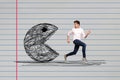 Creative collage of funky guy running away scared looking pacman painted game character isolated over lined paper page Royalty Free Stock Photo