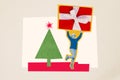 Creative collage of girl wear santa claus hat holding huge package gift box for christmas midnight near evergreen tree